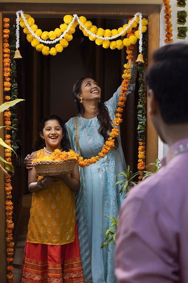 Grey marble bathroom with round mirror and floating sink